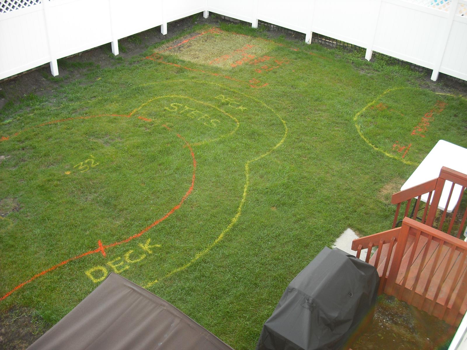 Painted layout lines mark out the planned pool and surrounding spaces.