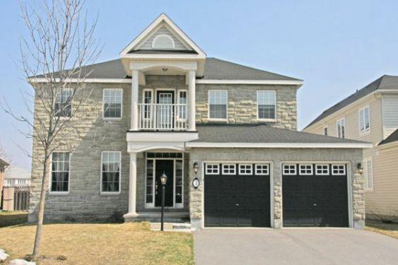 The original driveway and lawn before the landscape changes.
